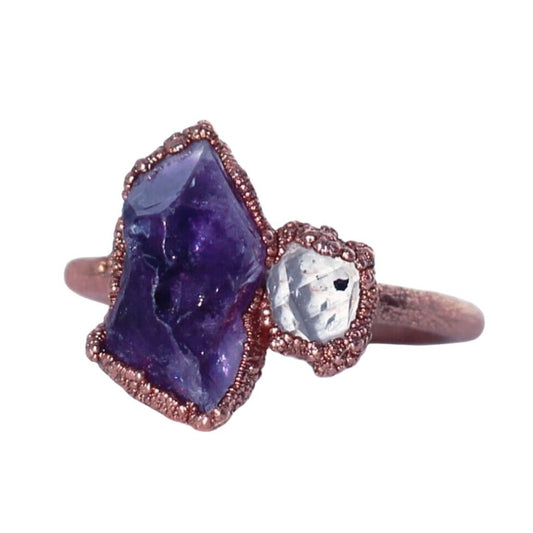 A rough, purple amethyst is paired with a tiny Herkimer diamond in this luxe and organic crown chakra ring. Stones are set in copper on a pure, solid copper band.