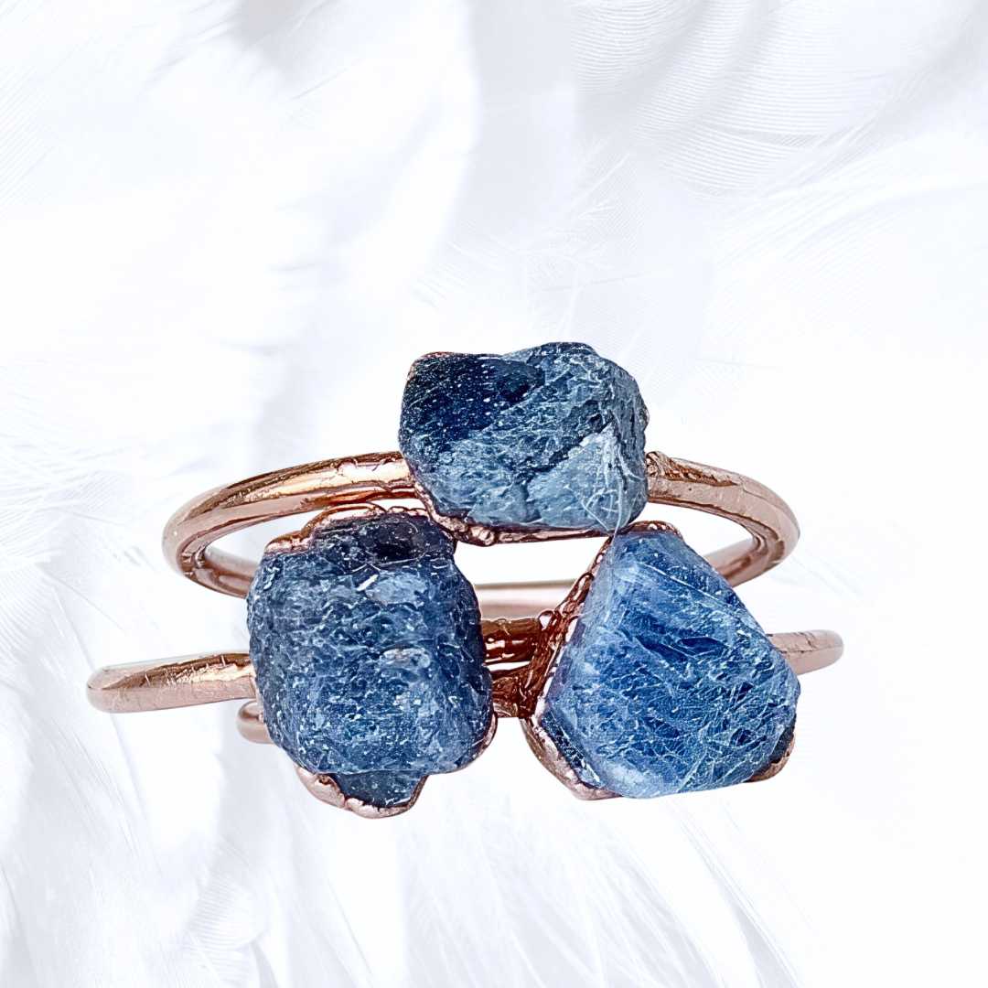 Raw sapphire stone rings set on copper bands